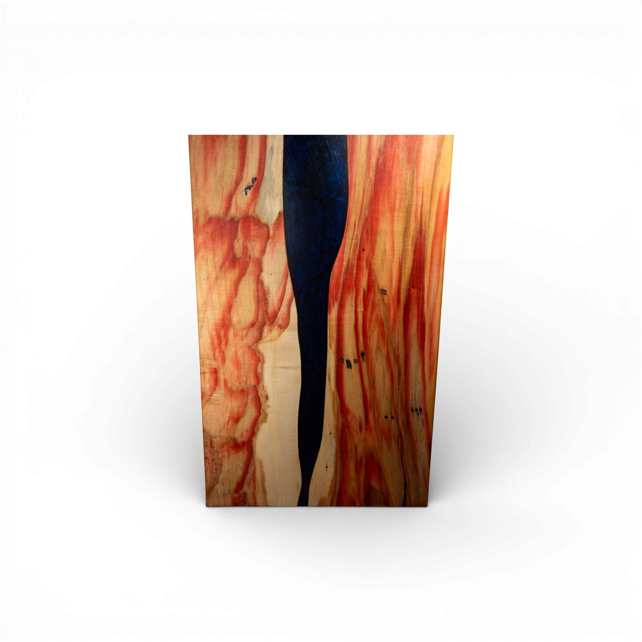 Dark blue epoxy river charcuterie board with warm wood tones