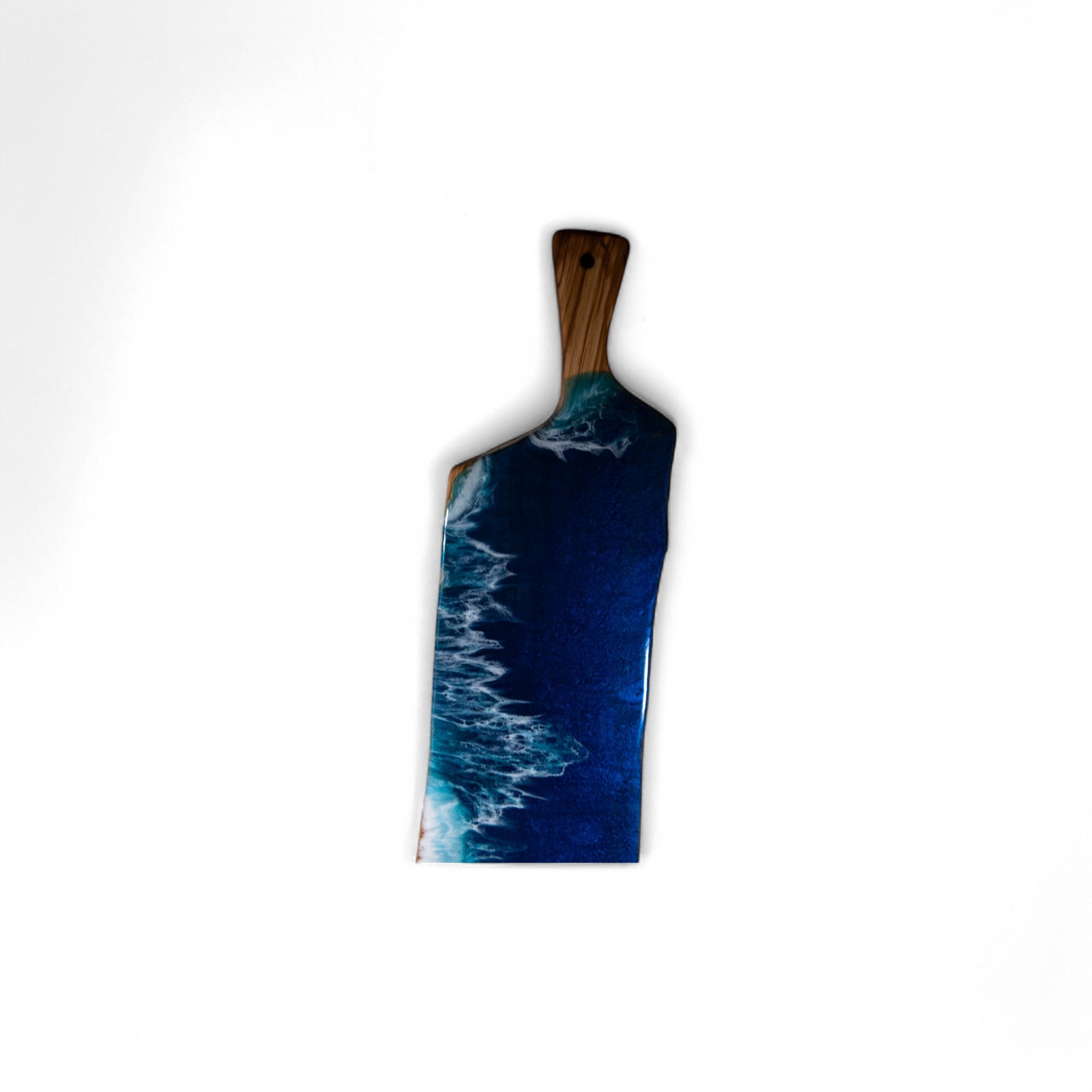 Handcrafted olive wood serving platter featuring deep blue resin wave detail