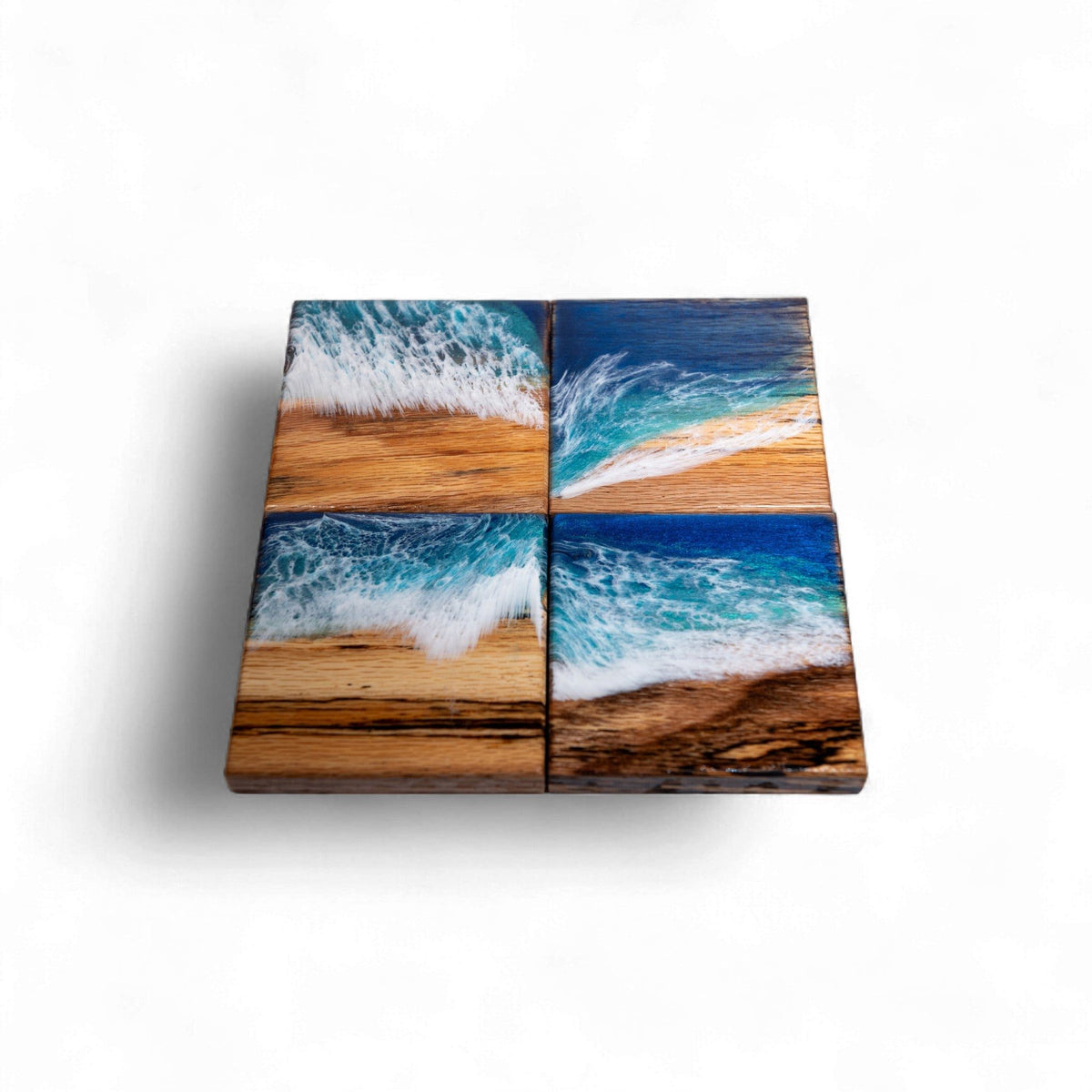 Four square Maple wood coasters with glossy Ocean Wave epoxy finish