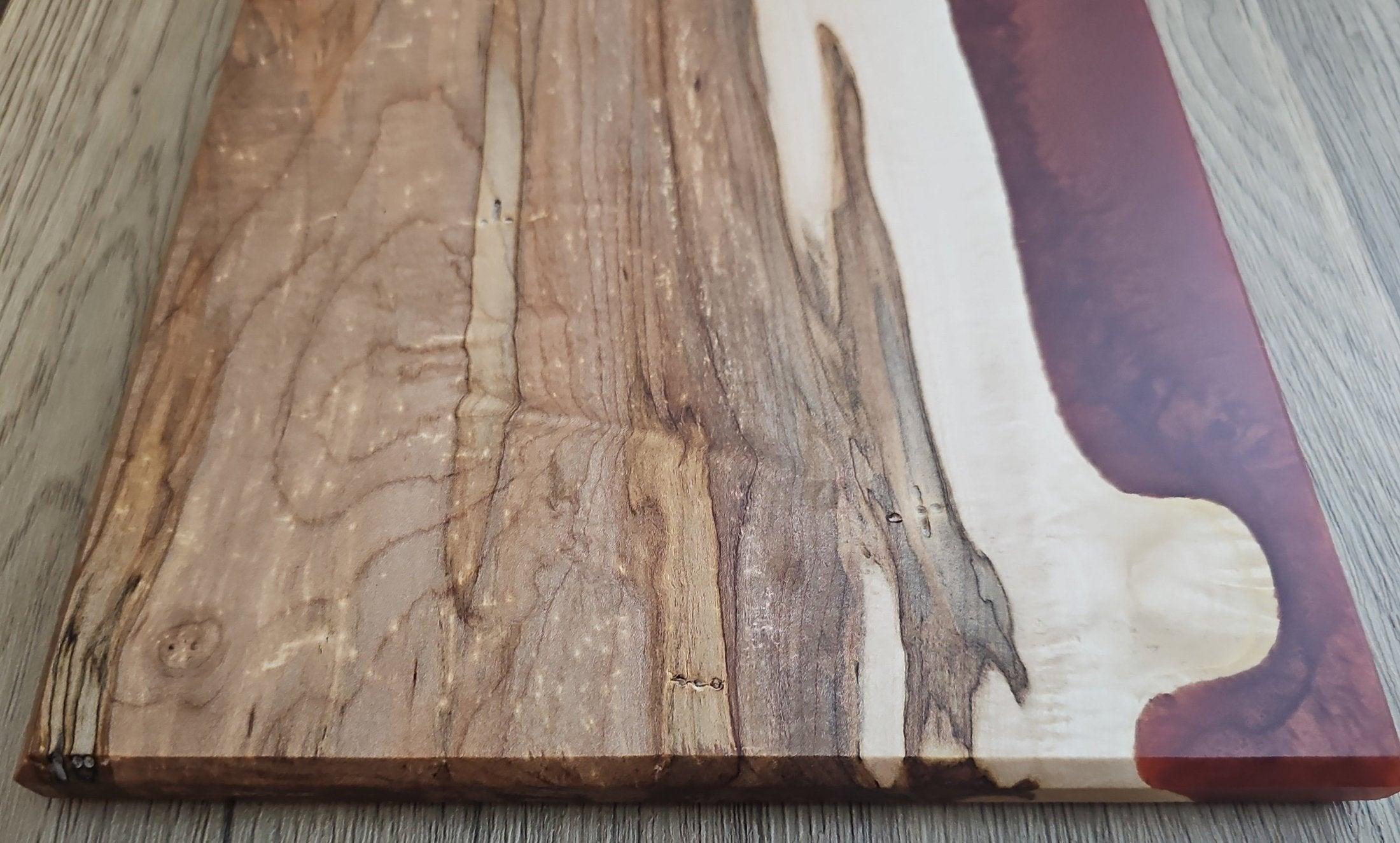 Full view of copper epoxy walnut maple charcuterie serving board