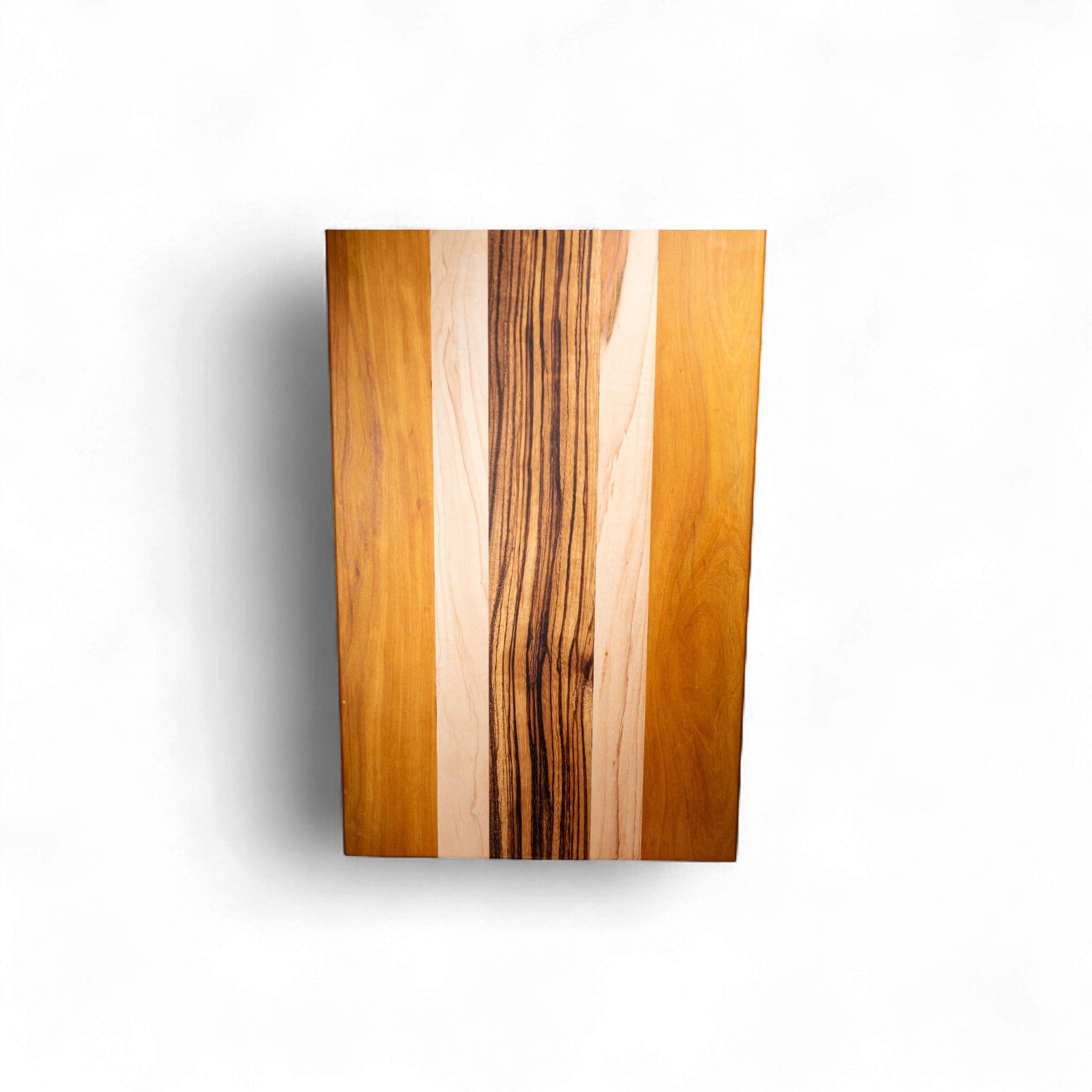 Maple Zebra Yellow Heart Charcuterie Board with vertical wood grain stripes