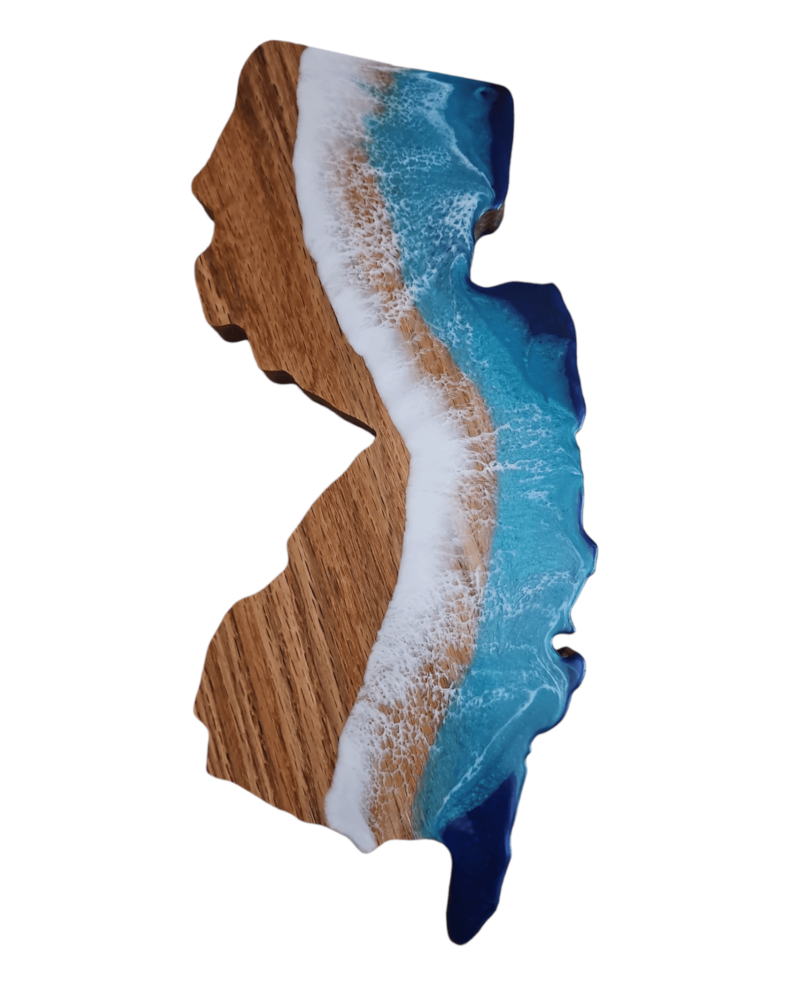 Side view of bamboo cutting board with layered blue and white epoxy waves