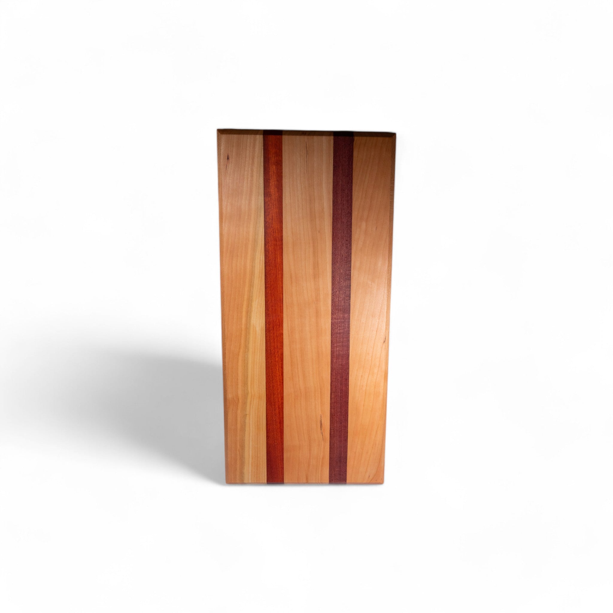 Handcrafted wooden serving board with cherry base and dual colored wood stripes