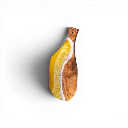 Yellow ocean wave resin olive wood charcuterie board with natural grain edge