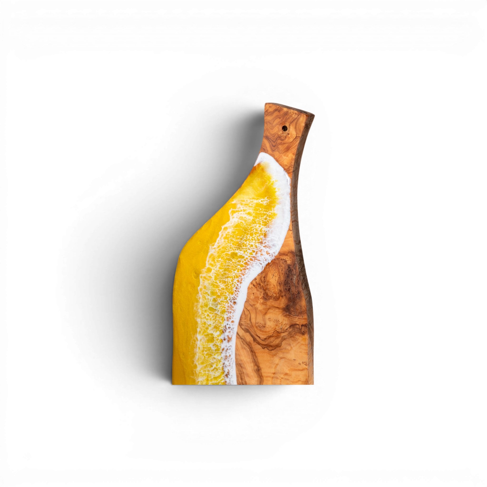 Side view of yellow resin inlay olive wood serving platter showing thickness
