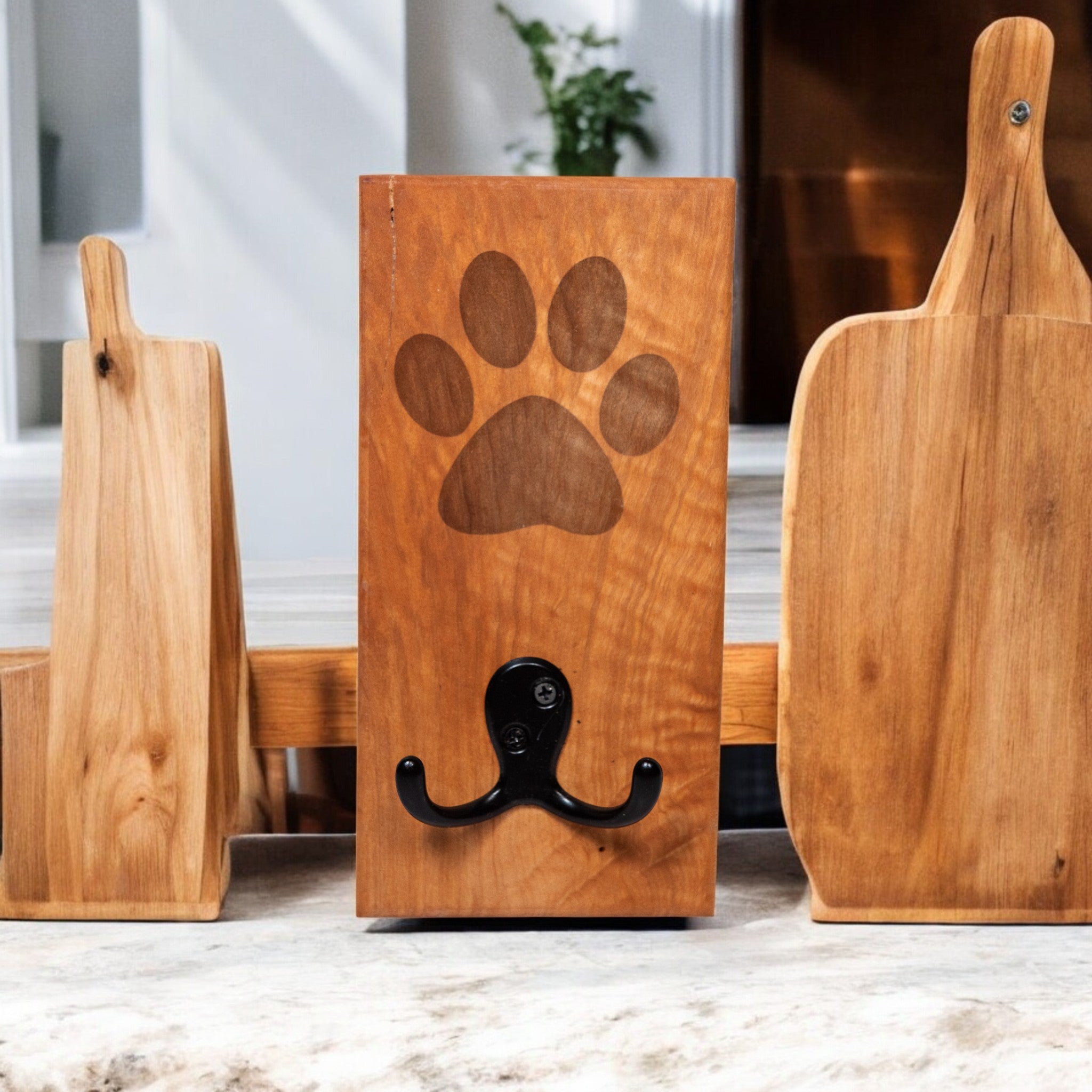 Cherry wood wall mount dog leash holder with engraved paw print and double hook