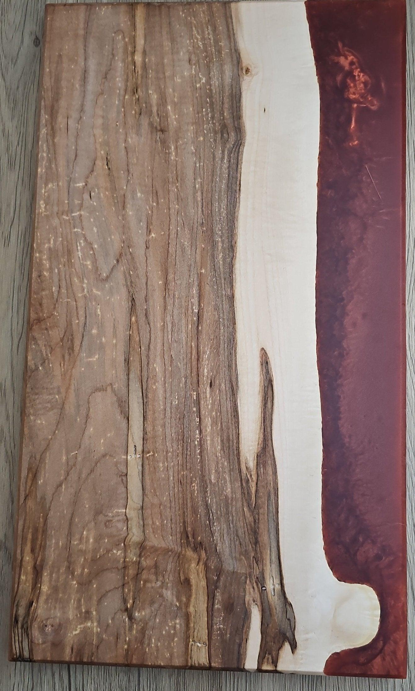 Rectangular maple wood serving board with vertical copper epoxy resin