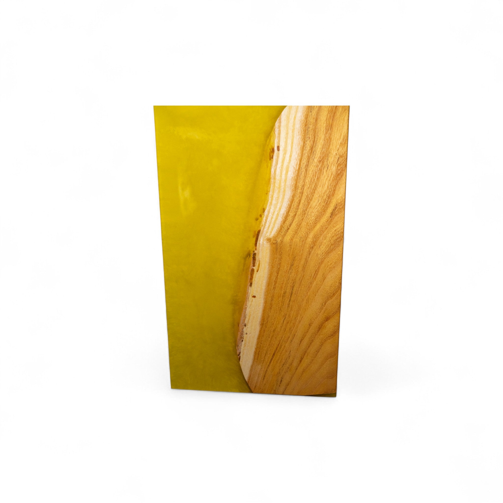 Top view of rectangular yellow epoxy and mulberry wood charcuterie board