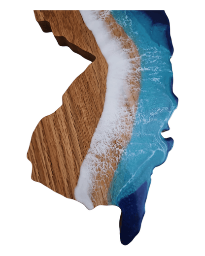 Top down view of bamboo serving board with matte wood and glossy resin contrast