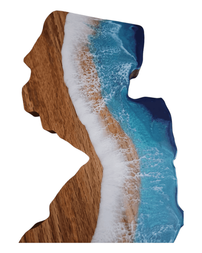 Front view of NJ shaped charcuterie board with glossy ocean resin finish