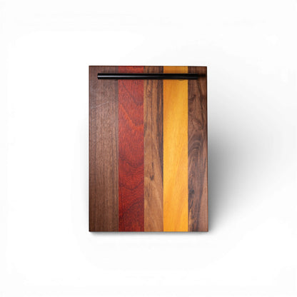 Rectangular wooden serving board featuring red padauk and walnut stripes with top handle