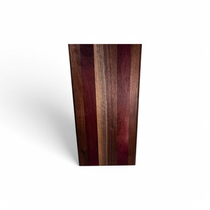 Walnut and purple heart wood charcuterie board with striped grain