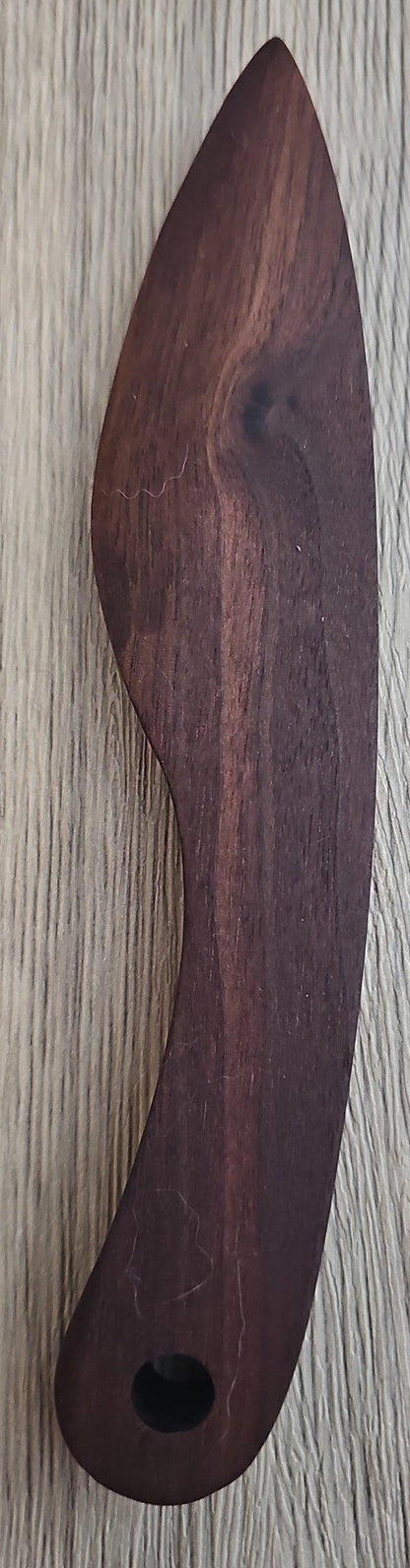 Rescued cedar charcuterie spreader featuring smooth oil finish and visible knot detail