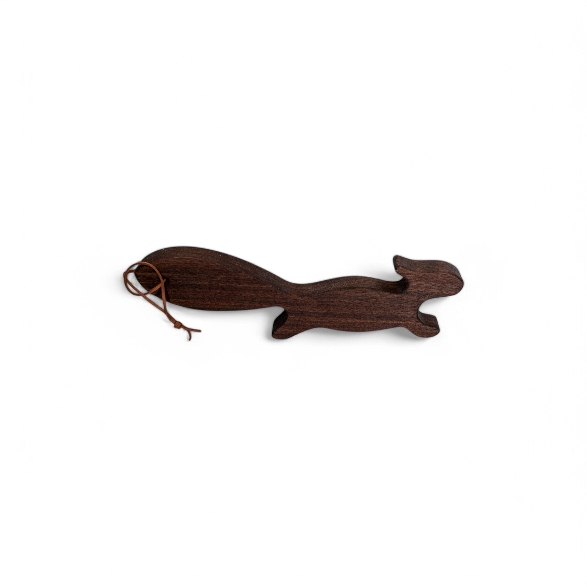 Carved dark walnut squirrel oven rack puller in running pose