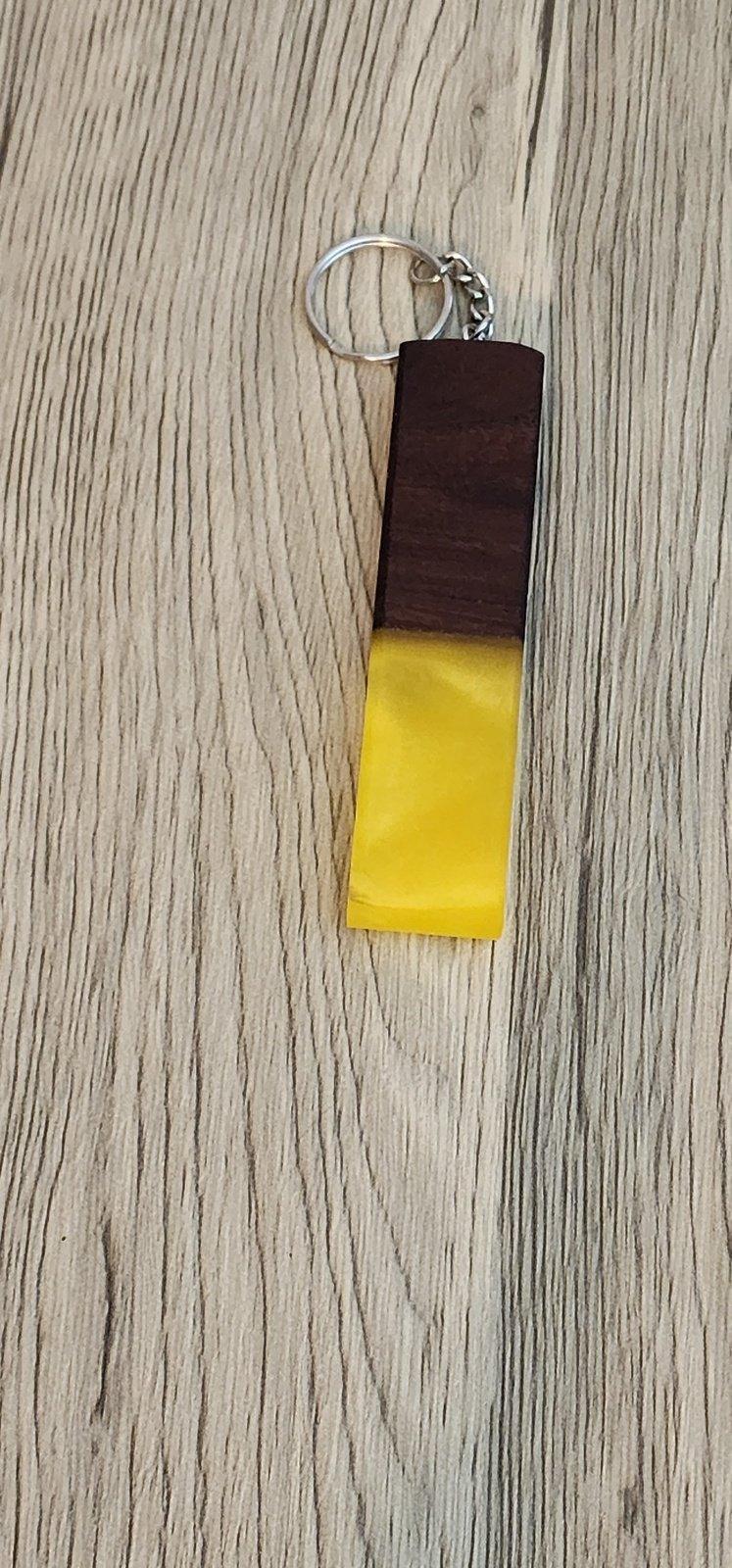 Bright yellow epoxy and dark wood keychain with ring